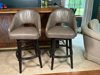 A Pair Of Nailhead Detail Swivel Bar Stools