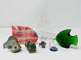 Collection Of Sailboat And Fish Figurines