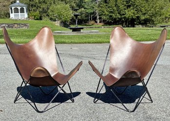 A Pair Of Vintage Modern Butterfly Chairs In Chestnut Leather