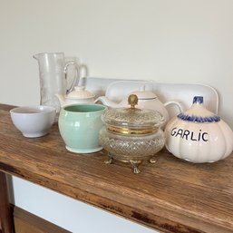 An Assortment Of Teapots And Tableware