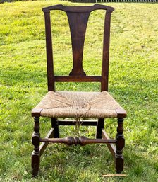 An Antique Mahogany Rush Seated Side Chair