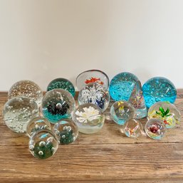 A Collection Of 17 Hand-Blown Glass Paperweights