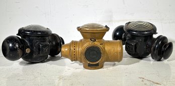 A Trio Of Antique Train Lanterns