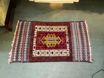 A Vintage Hand Knotted And Dyed Persian Carpet