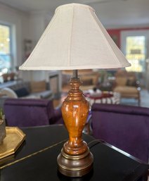 A 1920's Mahogany Urn Form Lamp On Brass Base