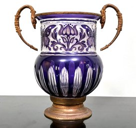 A 19th Century Belgian Amethyst Glass And Brass Urn With Brass Handles And Base By Val St. Lambert