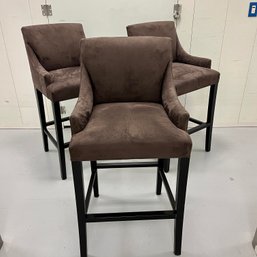 A Set Of 3 Brown Suede Counter Height Chairs