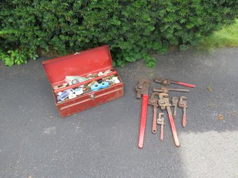 Red Tool Box With Plumbing Supplies And Wrenches