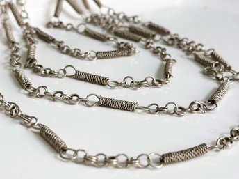 A Silver Woven Rope Form Necklace