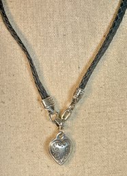 Braided Leather And Silver Tone Necklace Having Heart Pendant 16'