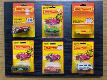 (6) Vintage Hot Wheels Cars On Cards In Protective Cases. Red Rider, Pizza Van, Sun Burner, '57 T Bird, Cobra