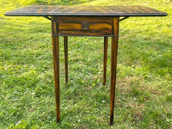 A Magnificent Faux Grained Pembroke Table