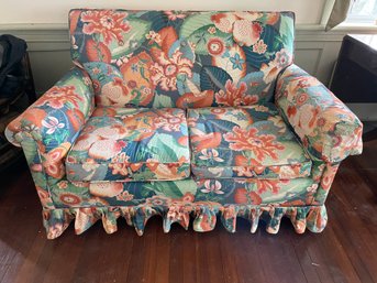 Colorfully Upholstered Love Seat Sofa.