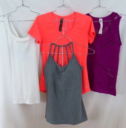 A Grouping Of 4 Women's Athletic Tops - Size Small