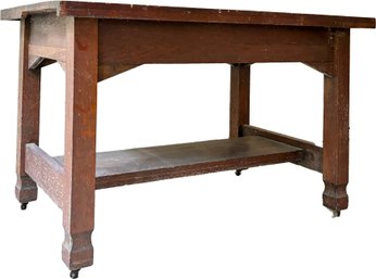 An Early 20th Century Craftsman Oak Trestle Table