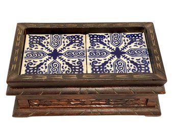 Intricately Carved Wooden Box With 2 Blue & White Tiles On The Top Of The Lid