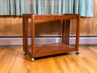 A Rolling Cart In Stained Wood With Open Upper & Lower Shelves