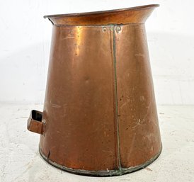 A Large Antique Copper Pitcher