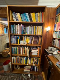 A DAINISH MODERN TEAK FINISH BOOKCASE