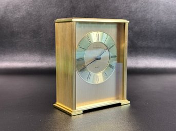 A Lovely Small Clock In Brushed Brass By Portsmouth