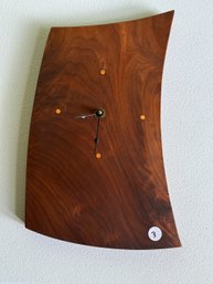 AN MCM WOOD SLAB WALL CLOCK