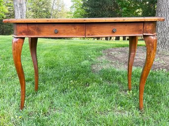 An Antique Inlaid Crotch Mahogany Desk