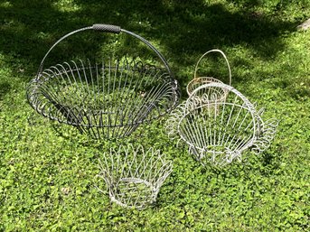 An Assortment Of Metal Wire Planter Baskets