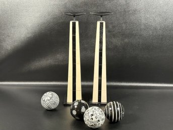 A Pair Of Obelisk Column Candle Holders & Compatible Ceramic Orbs In Black & White