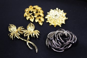 LOT: FOUR SILVER TONE AND GOLD TONE BROOCHES ORGANIC FORMS