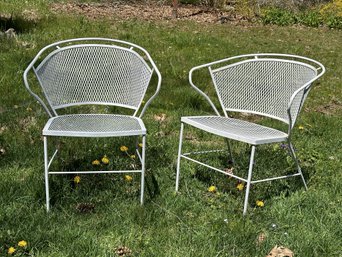 A Pair Of Barrel Back Outdoor Chairs In White Metal Mesh