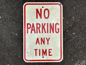 A 'No Parking Any Time' Sign
