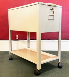 A Vintage Rolling Metal File Drawer Unit