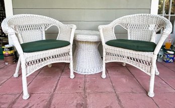 A Pair Of Faux Wicker Arm Chairs And A Vintage Wicker Side Table