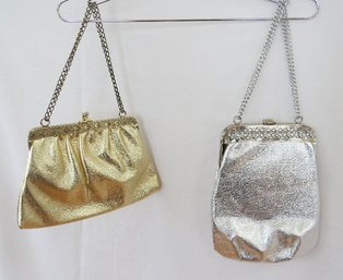 A Pair Of Gold And Silver Tone Evening Bags With Chain Straps