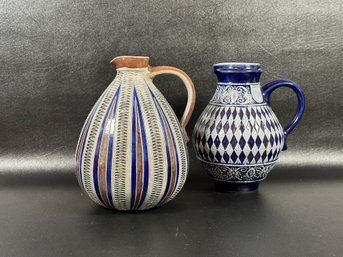 A Gorgeous Pair Of Compatible Pottery Pitchers From France & Germany