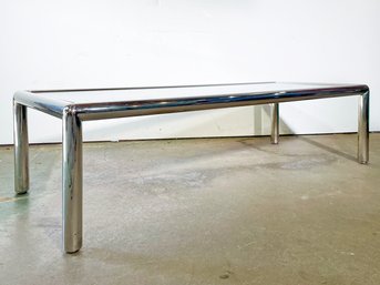 An Awesome 1970's Mod Chrome And Smoked Glass Coffee Table