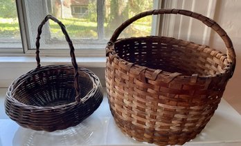 Two Round Baskets With Handles