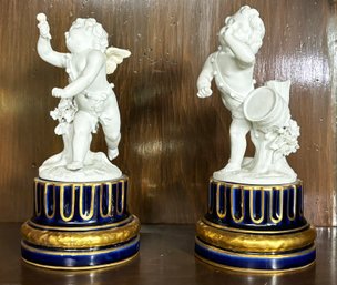 A Pair Of Sevres Biscuit Porcelain Cherubim On Cobalt Porcelain Plinths, Late 18th Century