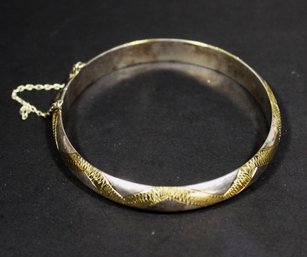 FINE STERLING SILVER BANGLE BRACELET HAVING GOLD DECORATION