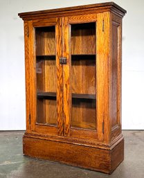 A 19th Century Paneled Oak Built In Corner Cabinet Or Book Shelf