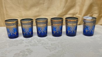 A Set Of 6 Blue & Gold Glass Votive Holders