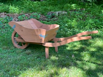 A Decorative Wooden Wheel Barrow