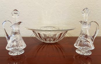 A Pair Of Crystal Cruets And A Serving Bowl