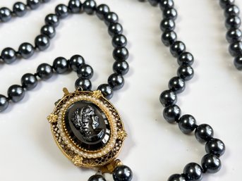 A Vintage Beaded Necklace With Cameo Pin Pendant