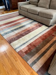 An Striped 11' X 8' Wool Area Rug- Family Room