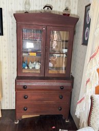 AN EARLY AMERICAN SECRETARY IN OLD RED MILK PAINT