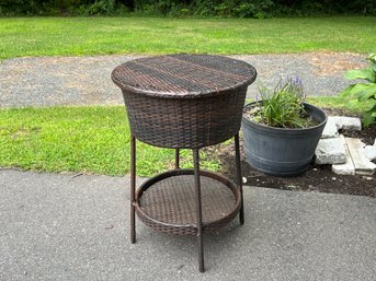 A Wicker Lift Top Outdoor Table