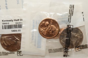 Uncirculated Kennedy Half Dollar And Sacagawea Dollars - Littleton Coin Co. Packaging Sealed