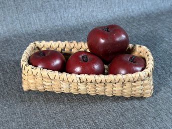A Set Of Four Realistic Faux Red Delicious Apples
