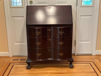 A Vintage Slant-top Secretary Desk By Maddox Tables